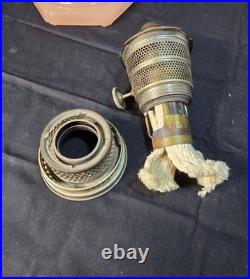 Antique Aladdin Model B Corinthian kerosene lamp in rose moonstone glass