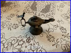 Rare Bronze Aladdin oil, genie lamp 7 inches long 5 inches high