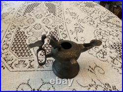 Rare Bronze Aladdin oil, genie lamp 7 inches long 5 inches high