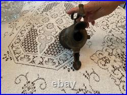 Rare Bronze Aladdin oil, genie lamp 7 inches long 5 inches high