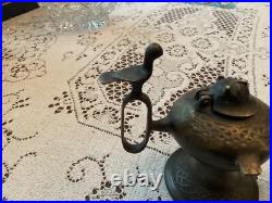 Rare Bronze Aladdin oil, genie lamp 7 inches long 5 inches high