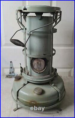 Vintage aladdin kerosene heater, blue flame lamp lantern antique